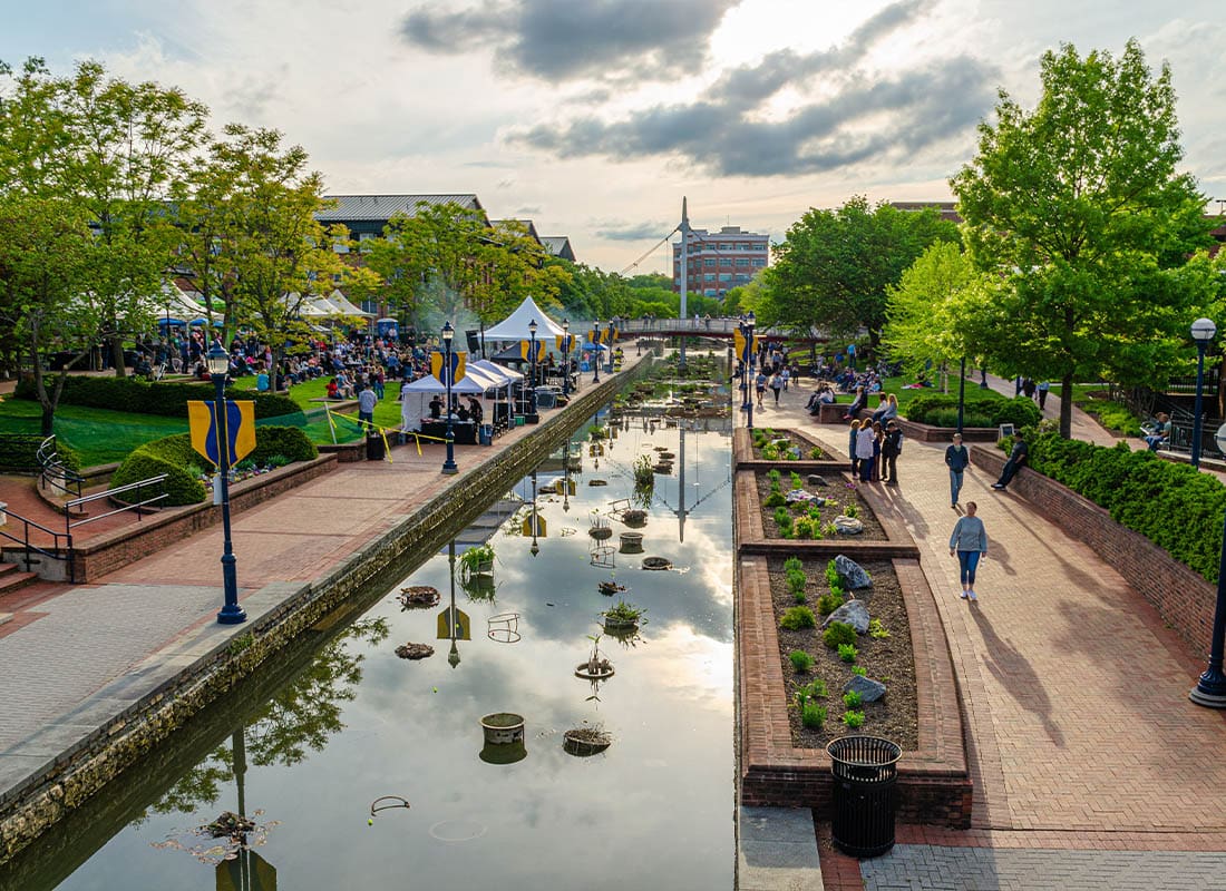 Frederick, MD - Carroll Creek Park With a Fair and Lots of People in the Background